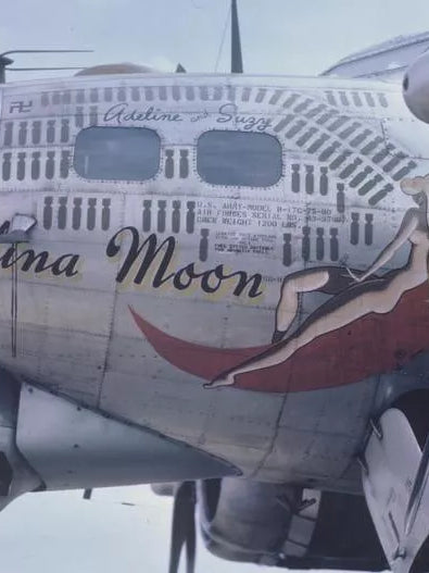 B-17 Flying Fortress with 'Carolina Moon' nose art painted to fuselage