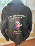Seal brown jacket with hand painted design on a plain background